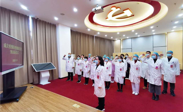 市婦幼保健院成立疫情防控健康宣教突擊隊宣誓.jpg