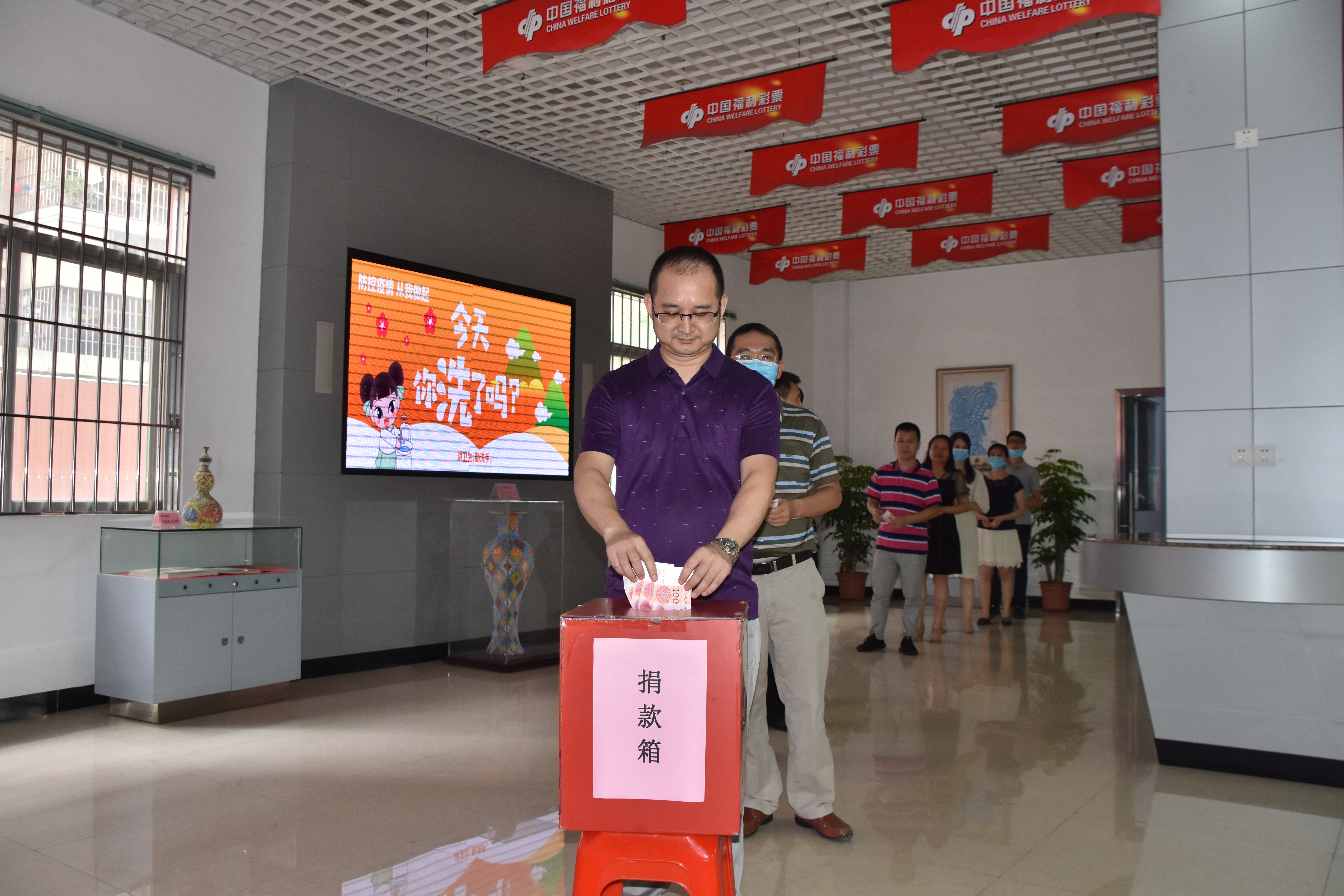 江門市福彩中心干部職工踴躍捐款.jpg